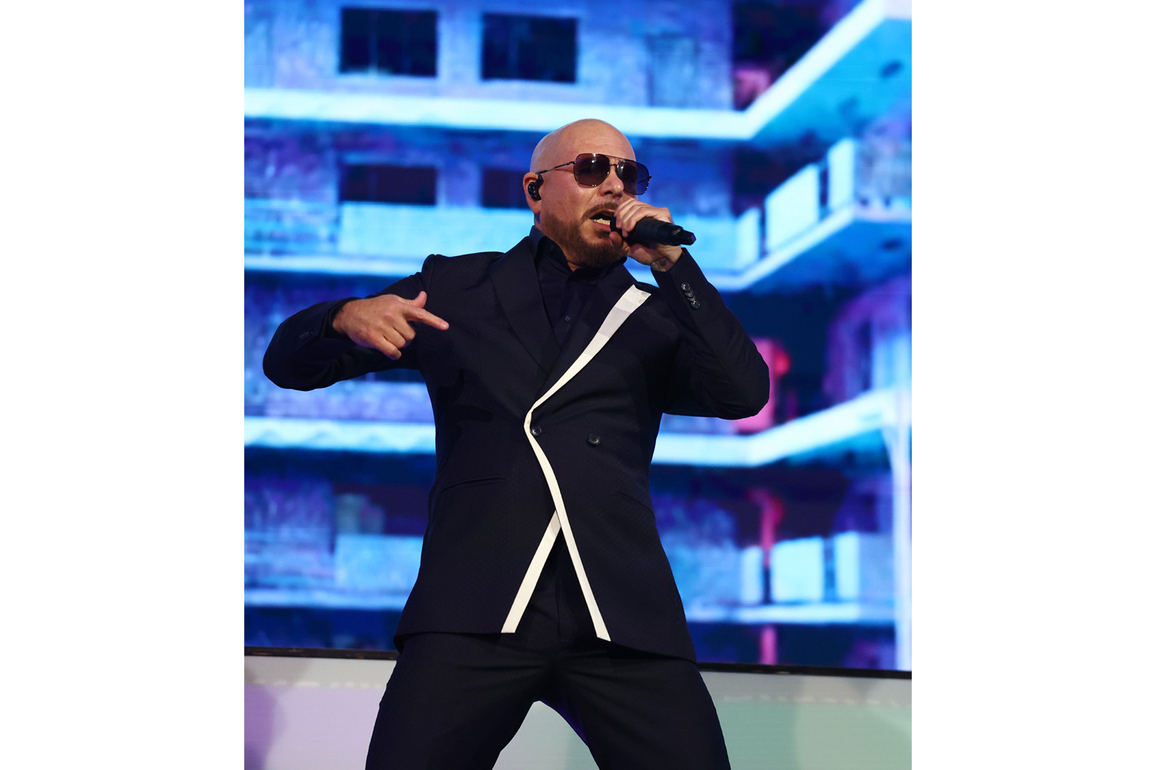 Pitbull announces mission to break Guinness Record for largest gathering wearing bald caps