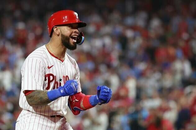 Phillies rout Marlins with record 8 homers, clinch first-round bye