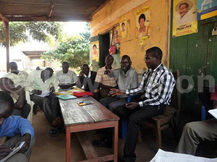  he youths having a sesnitization meeting with farmers in amuli district 
