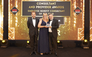 Jimmy McGhie (left) presents the accolade to Barnett Waddingham partners Julia Turney (centre) and Damian Stancombe (right)