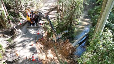 A Lumesa LDA 91 drilling attachment mounted on a Volvo excavator providing a slope stabilisation solution in Australia