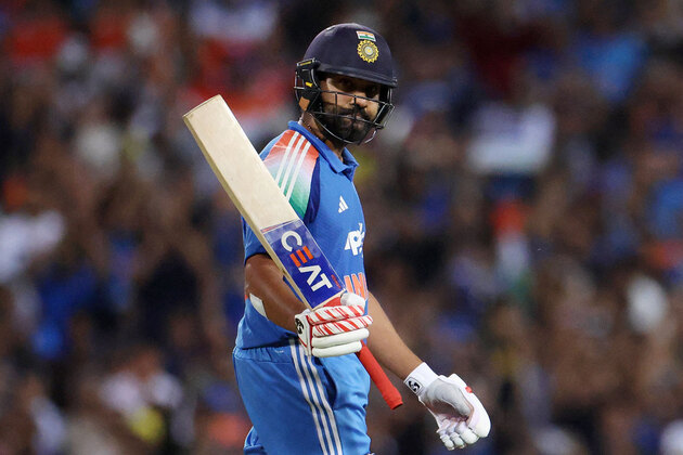 Rohit signs fan's jersey after arriving in Mumbai following memorable ODI series in Australia