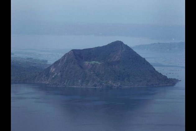 Flights grounded as volcano erupts near Manila