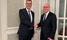  Mikko Keto, Group CEO, FLSmidth (left) shaking hands with Joachim Braun, Division President, Process Industries, ABB