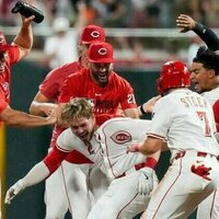 Reds rally late, walk off Yankees in extras