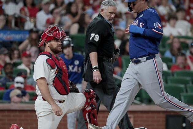 Cardinals claw back to tie game, but see troubling ninth down them in loss to Rangers