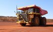 The 300th Komatsu AHS truck rolls out onto the red Pilbara dust on a Rio Tinto site. Photo courtesy Komatsu