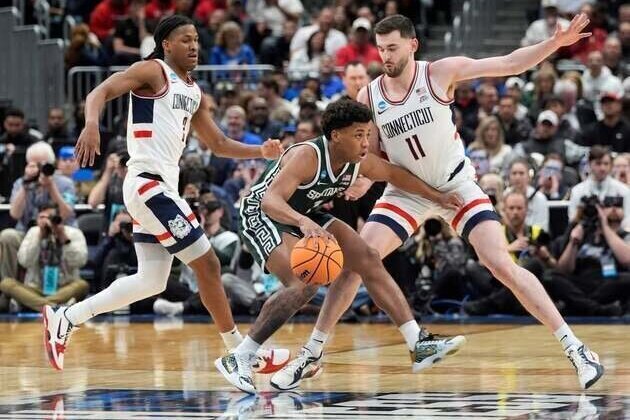 No. 2 UConn squanders lead, recovers to down Michigan State