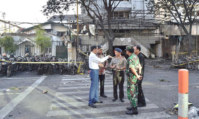 Two militants on motorcycle blow themselves up at Indonesian police headquarters Two militants on motorcycle blow themselves up at Indonesian police headquarters