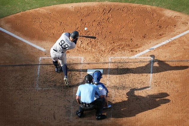 Backed by 4 HRs, Yanks' Gerrit Cole 7-0 after stifling Dodgers