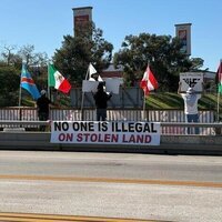 Protest banners on California freeways