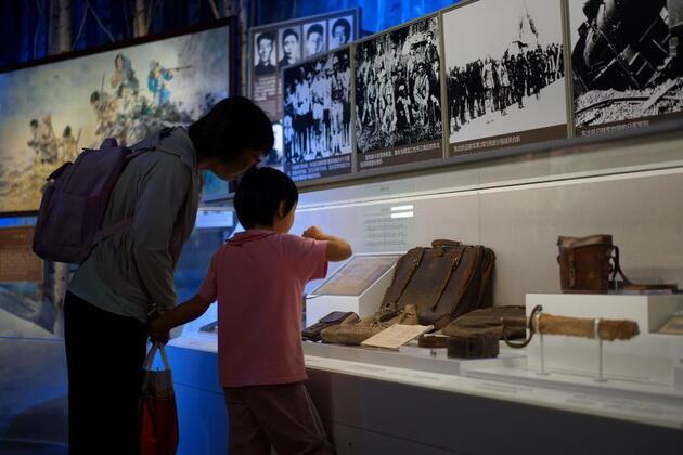 Asia sounds alarm as Japan whitewashes wartime history amid military buildup