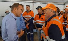 NSW Planning Minister Robert Stokes, with Premier Mike Baird behind him, meet with Drayton mine workers in 2015. 