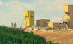 Uranium miner lowers costs, production