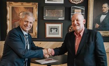 SmartSat CRC CEO, Professor Andy Koronios, and Elders CEO, Mark Allison, sign an MOU to drive space tech in Australian agriculture. Photo supplied.