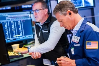 U.S. stocks climb wall of worry, but finish in front