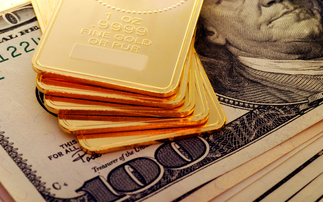 Gold holds above $5,000 mark as dollar continues to sink