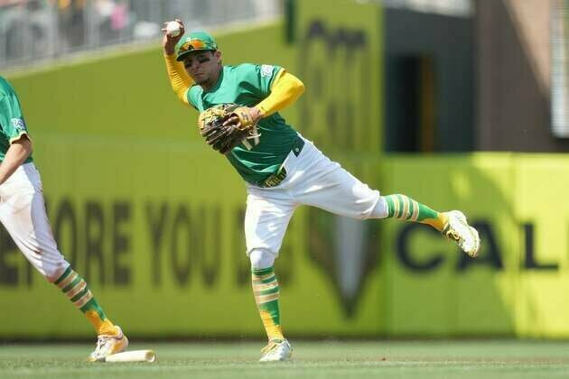 J.T. Ginn helps Athletics slide past Mets