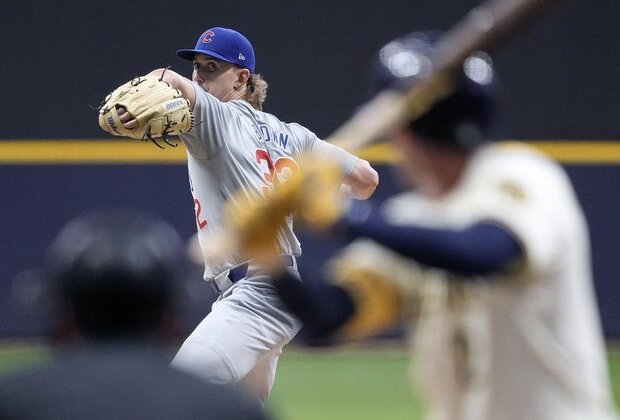 Cubs score five in 10th to beat Brewers