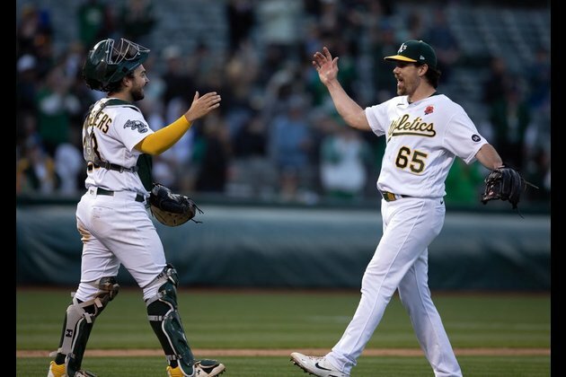 MLB roundup: A's dump Braves, end 11-game skid