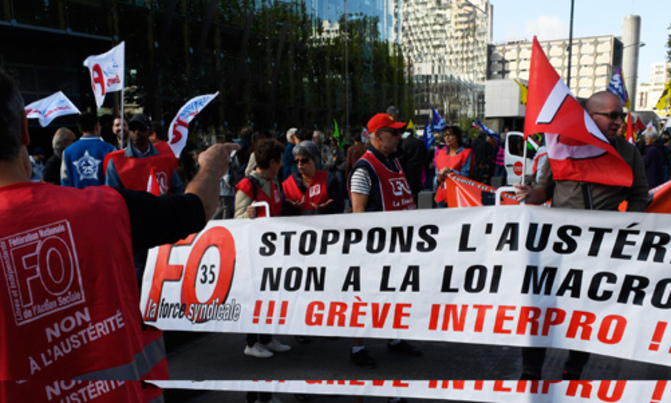 Labour protests hit France in key challenge for Macron Labour protests hit France in key challenge for Macron