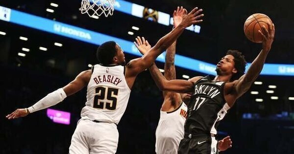 Ex - NBA players Malik Beasley , Ed Davis indicted in betting probe