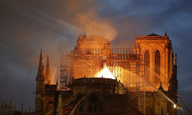 Paris stunned as fire ravages Notre-Dame cathedral Paris stunned as fire ravages Notre-Dame cathedral