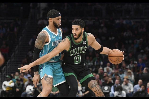 Hornets rally late, pull out OT win to end Celts' streak