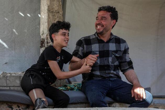 Mideast in Pictures: Wounded and displaced, Gaza's disabled boy struggles to survive