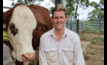  Dr Thomas Williams is leading a research project which uses smart collars on cows to monitor behaviour and movement. Picture courtesy University of Queensland.