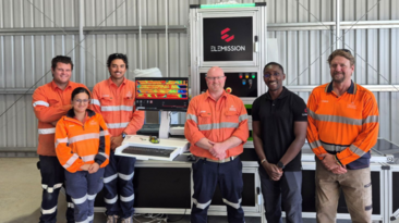 Hillgrove geological team with ECORE Elemission technician in front of the ECORE core scanning system at Larvotto’s exploration facility