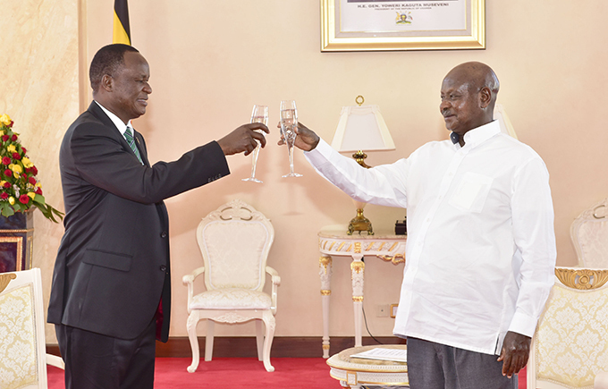 ulius iema ilonzo shares a toast with resident useveni after presenting his credentials  hoto