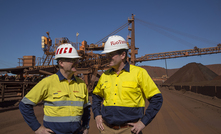 WA Premier Mark McGowan and Rio Tinto Iron Ore chief executive Chris Salisbury with the original stackers at Paraburdoo