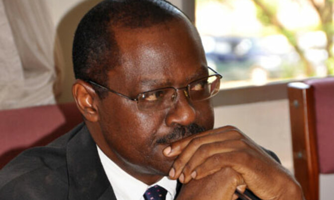 Drama as MPs force Makubuya to sign Police summons Drama as MPs force Makubuya to sign Police summons