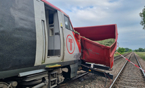 Farmer called signaller before being hit by 80mph train at rail crossing