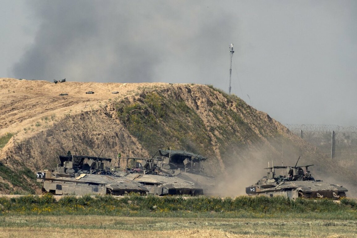 Israeli troops close in on militants in eastern section of Gaza City; kill Hamas leader in Lebanon