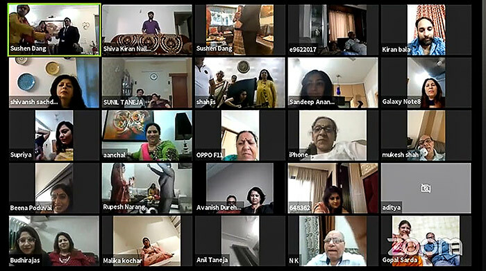  his handout screenshot of a video call on pril 19 2020 received courtesy of haadicom shows relatives and friends watching a livestream of wedding celebrations of groom ushen ang  in top  at his home in umbai and bride eerti arang not pictured 
