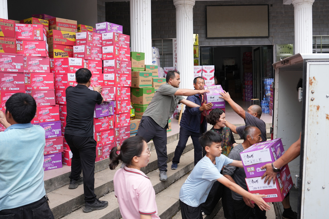 CHINA-HUNAN-CHANGDE-HEAVY RAINS-RELIEF OPERATIONS (CN)