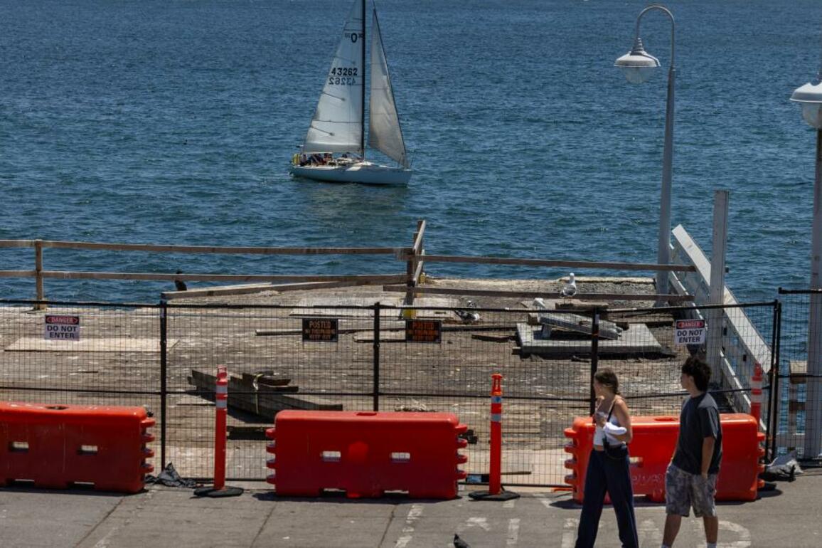 Will the Santa Cruz Wharf be rebuilt after it broke apart&quest;