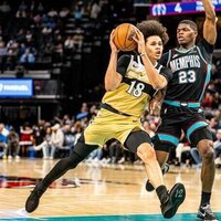 Wizards pick up rare win at short-handed Grizzlies' expense