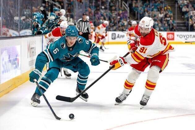 Flames score 4 straight goals, continue dominance of Sharks