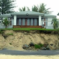 New climate report warns property prices face a $611 billion hit. What does that mean?