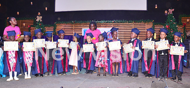  ome of the graduands with their teachers