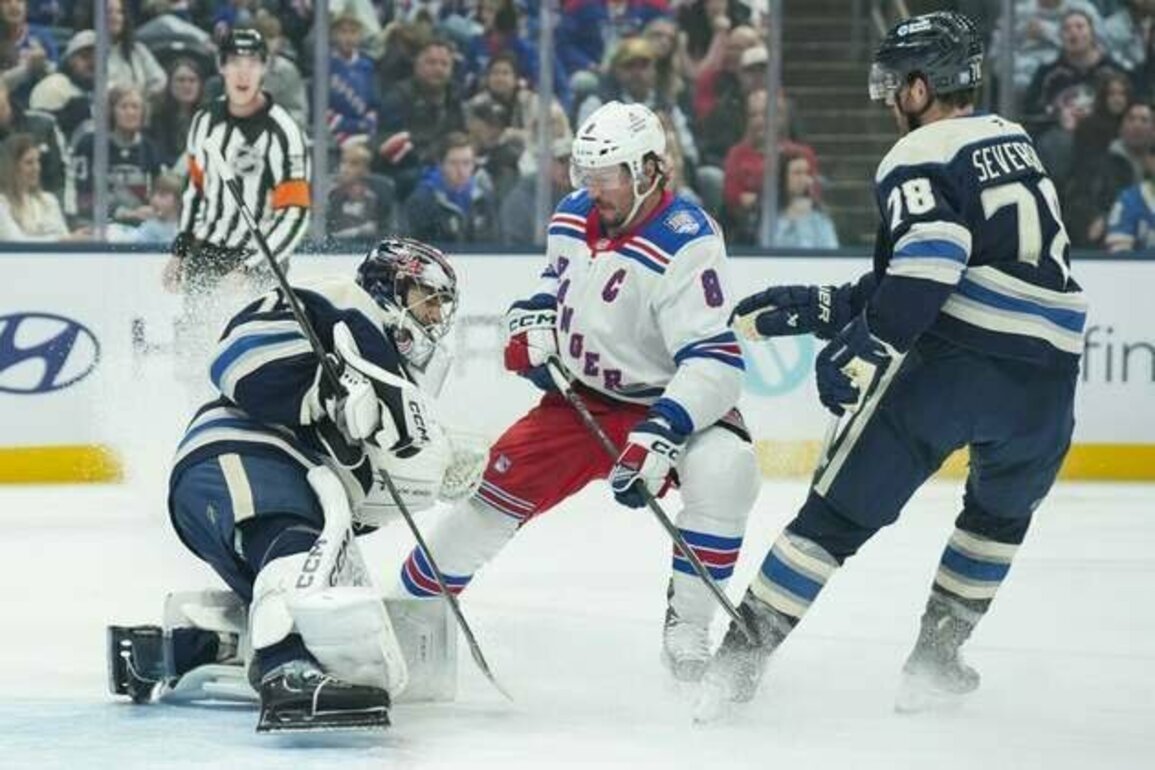 Thriving away from home, Rangers top Jackets in shootout