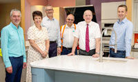 MP "keen that merchants play their part" in better housing after branch visit