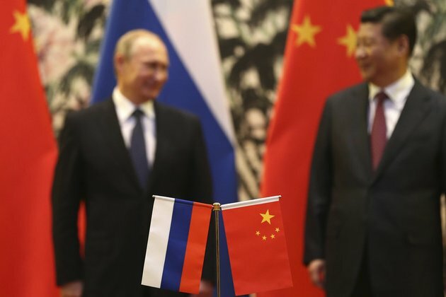 China backs Russia in distorted democracy row
