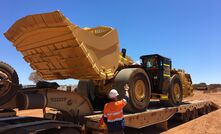 The R1700 loader arriving at Viviens for its trials.