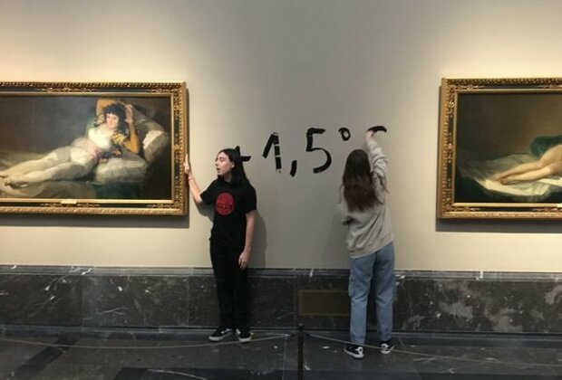 Climate activists glue themselves to Goya paintings in Madrid's Prado Museum