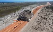  travelled via a 66-metre-wide, purpose-built road by Mammoet via platform vehicles