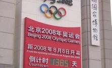 BHP settles Beijing Olympics probe